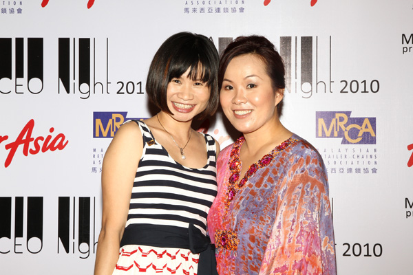 Emilia and Wai Yee, Director of Sun Light Radio Taxi