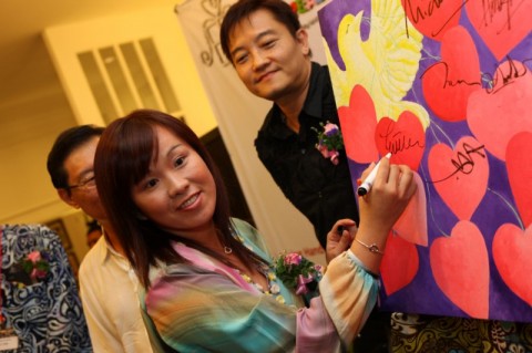 Emilia, during the opening of the Charity Art Exhibition