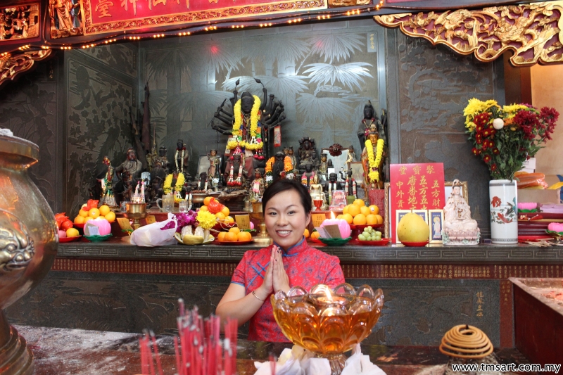 Praying at my aunt's GUAN YING temple at Kajang